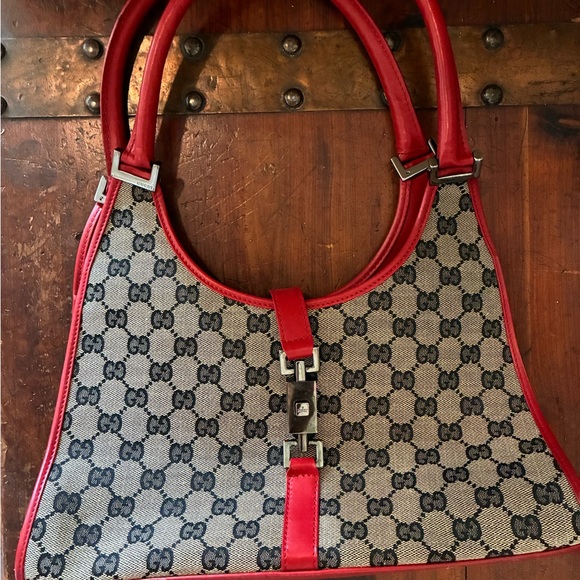 Red and Gray Shoulder Bag with Iconic Design